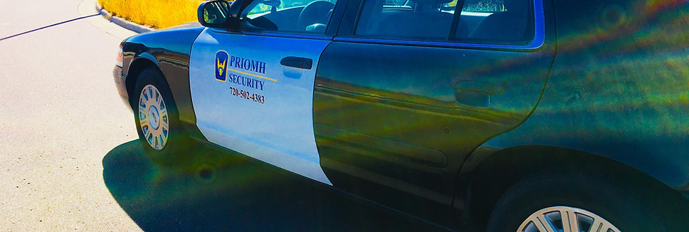 Priomh Security patrol vehicle with Colorado mountains in background